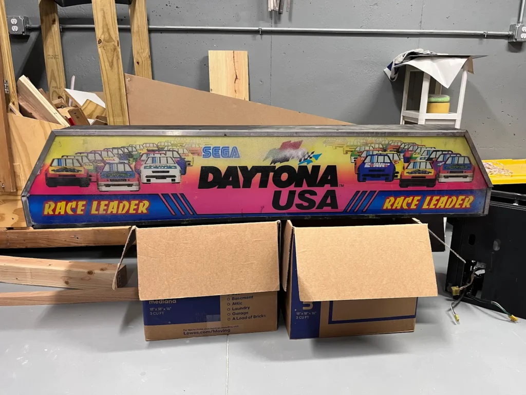 Daytona USA Twin Cab marquee before restoration