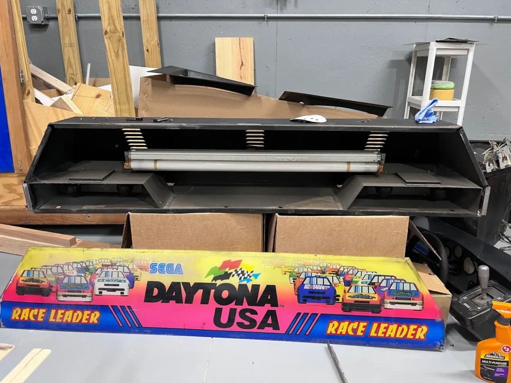 Daytona USA Twin Cabinet marquee opened for restoration