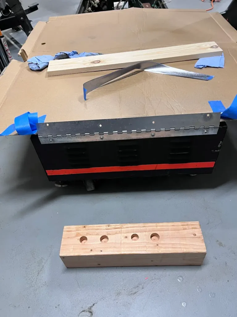 Daytona USA Twin Cab rear hinge restored with rust removed.