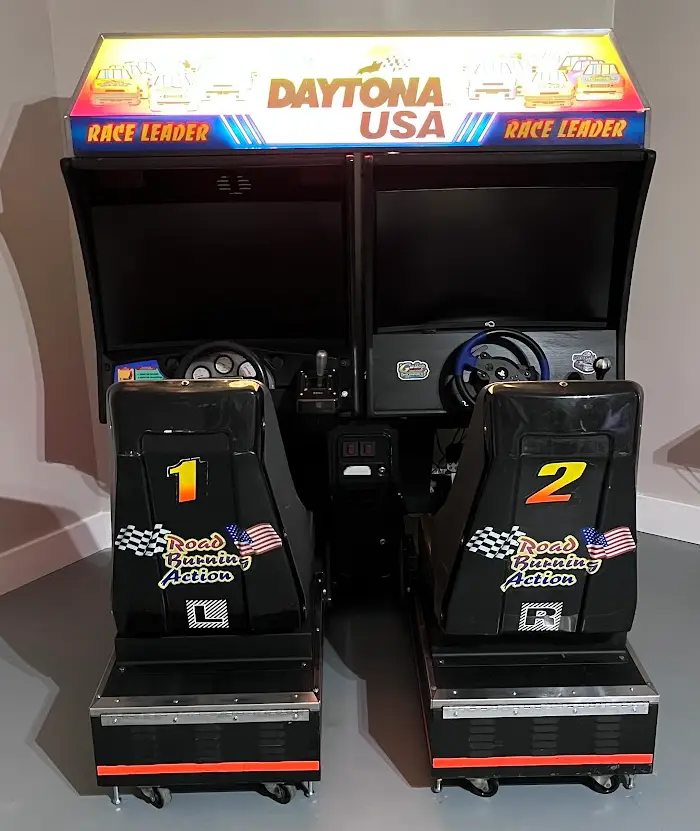 The restored Daytona USA twin cabinets. Cabinet 1 with most of the original hardware, but Cabinet 2 has mostly PC hardware.